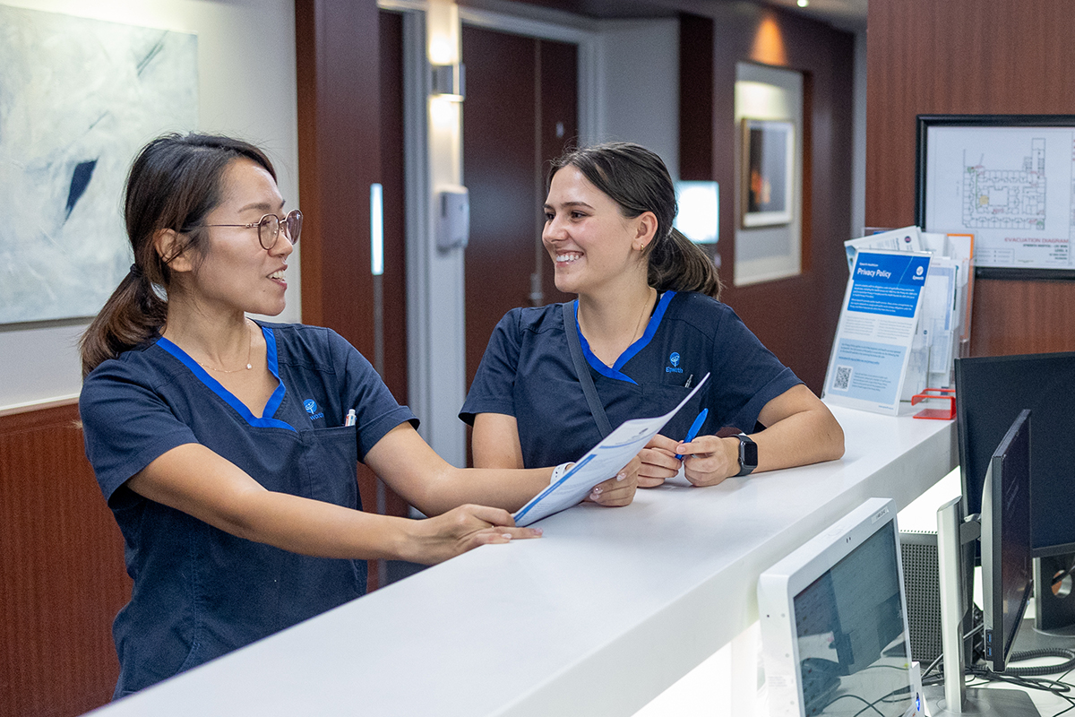 two nurses talking to each other